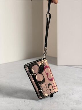 Coach Signature Wristlet Phone Case in Pink and Black
